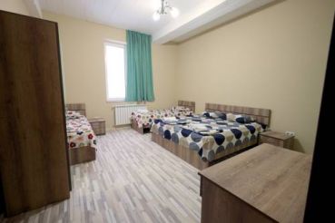 Quadruple Room with Private Bathroom