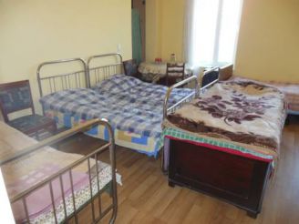 Single Bed in Dormitory Room